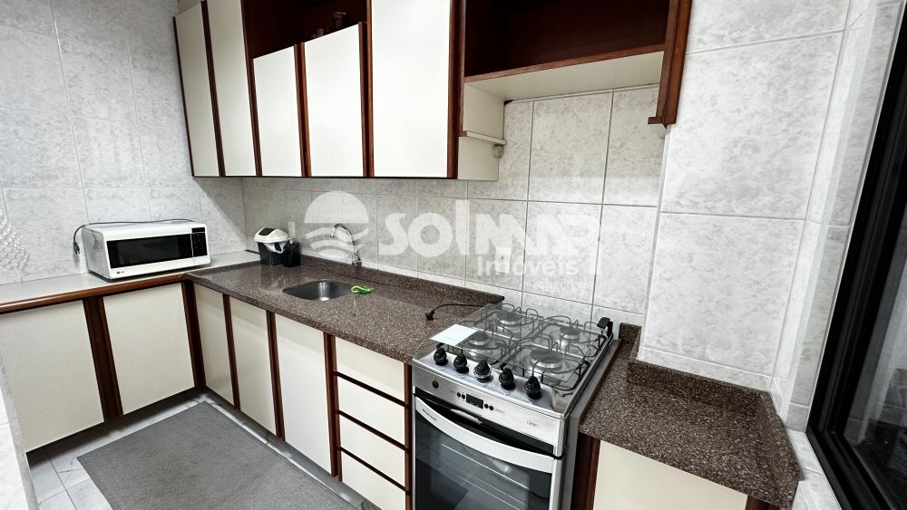 04 DORMIT�RIOS E 02 VAGAS DE GARAGEM - MEIA PRAIA